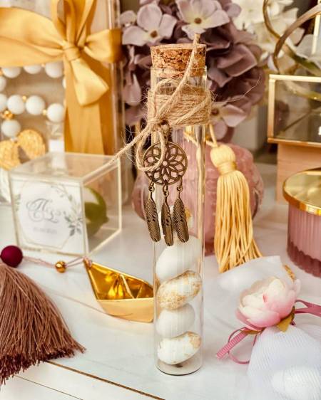 Μπομπονιέρα γάμου ή βάπτισης δοκιμαστικός σωλήνας στολισμένος με μεταλλική ονειροπαγίδα